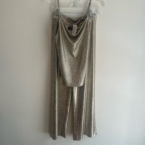 Pants are new with tags. Top is new without tags. Never worn sparkle set.